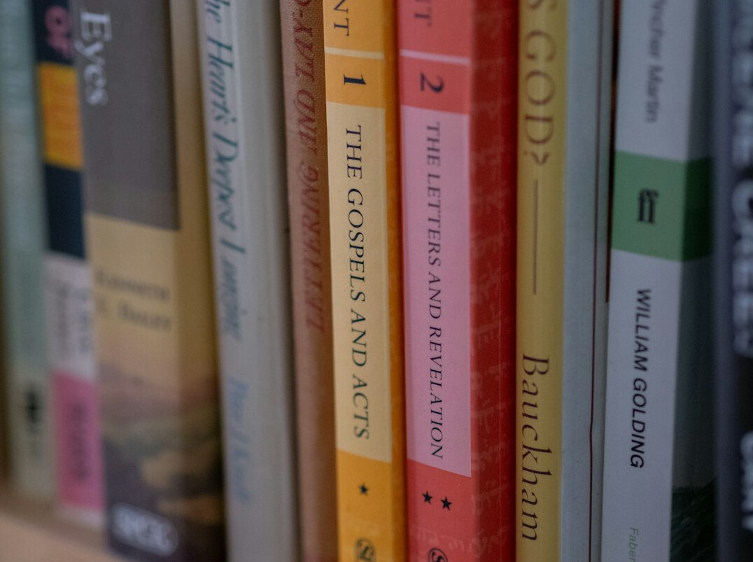 Colorful books stacked on a shelf