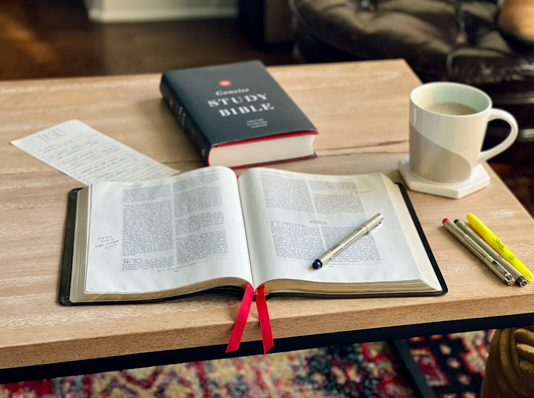 Open books and documents spread on a table